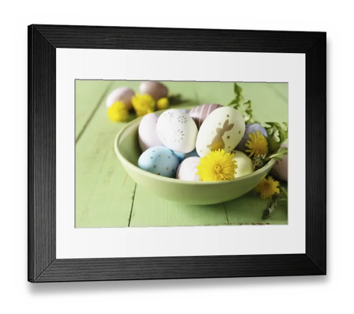 Framed Print : Happy Easter Holidays. Handmade Easter colorful eggs and spring flowers dandelions on a rustic wooden table