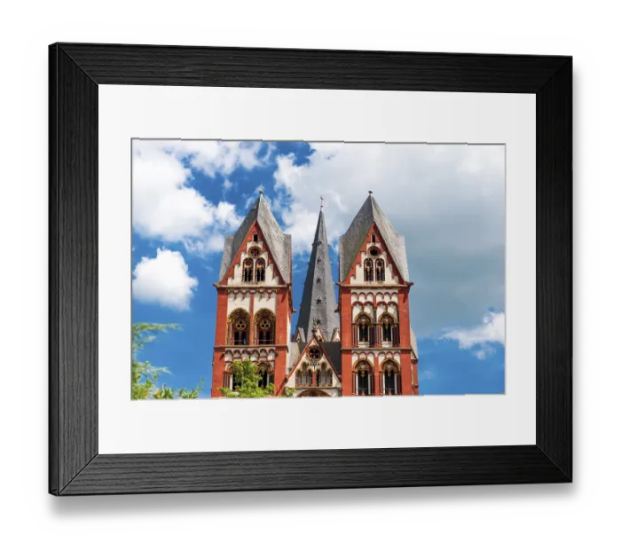Framed Print : The red and white exterior facade of Limburg Cathedral with its two main towers The red and white exterior fa