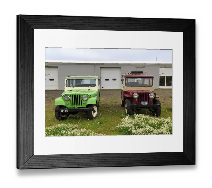 Framed Print : Two Willys Overland Jeeps parked next to each other