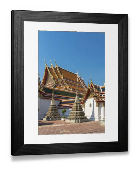 Framed Print : The temple complex Wat Pho with the main building called Prah Ubosot and the small Chedis Framed Print : The temple complex Wat Pho with the main building called Prah Ubosot and the small Chedis