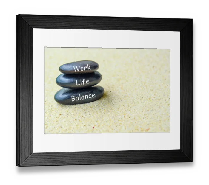 Framed Print : Work life balance text on black zen stones on sandy beach