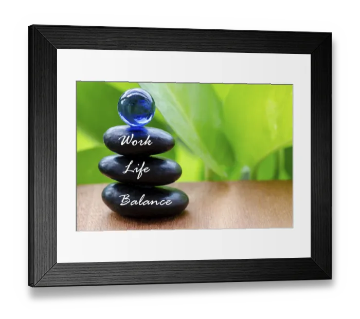 Framed Print : Work Life Balance text on black zen stones with blue glass marble on top Framed Print : Work Life Balance text on black zen stones with blue glass marble on top