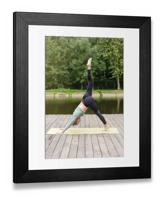 Framed Print : A slender woman in a green top and leggings Framed Print : A slender woman in a green top and leggings