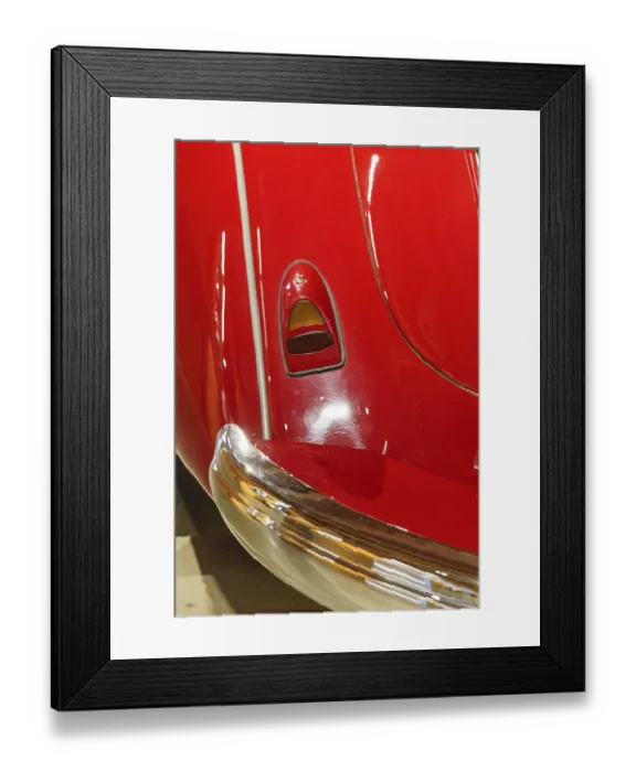 Framed Print : Part of a red classic car with chrome accents and shiny surface