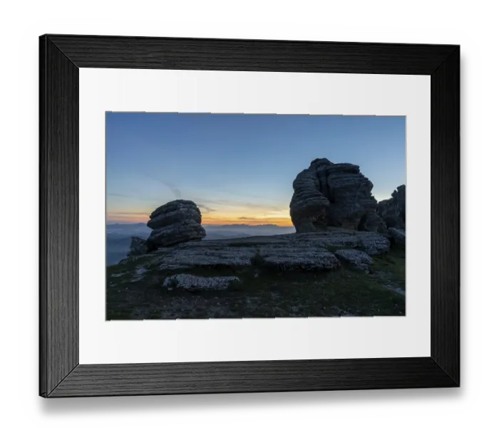 Framed Print : A view of El Torcal Nature Reserve in Andalusia with ist strange karst rock formations at sunset
