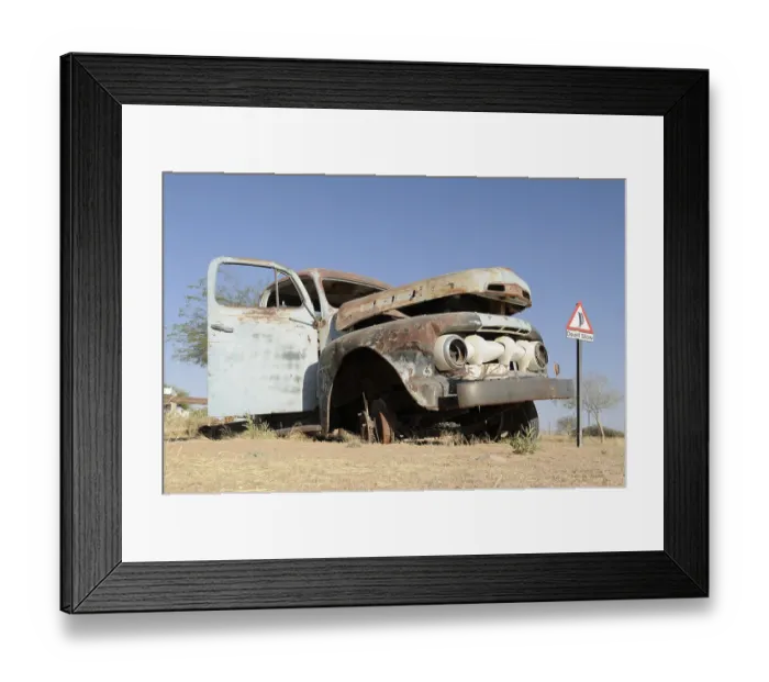 Framed Print : Road sign, Dead Slow, alongside a wrecked car