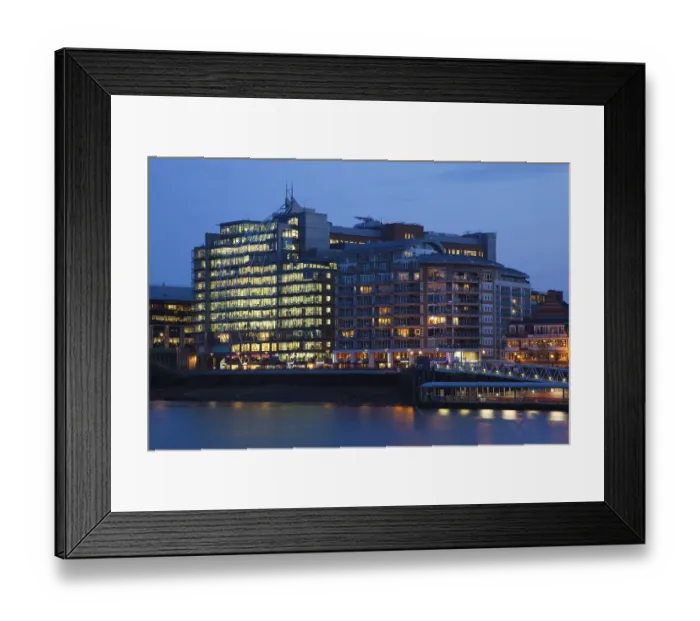Framed Print : Modern office and residential buildings by the River Thames at dusk