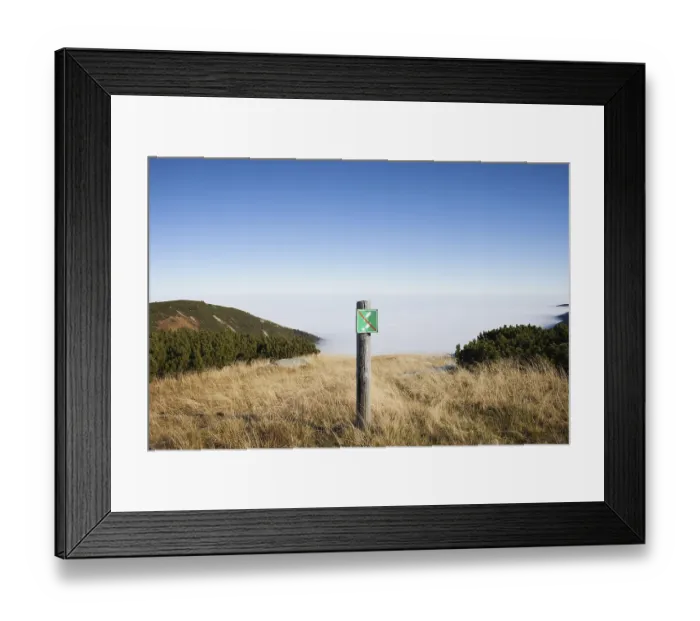 Framed Print : No entry warning sign on a meadow at precipice on mountain peak