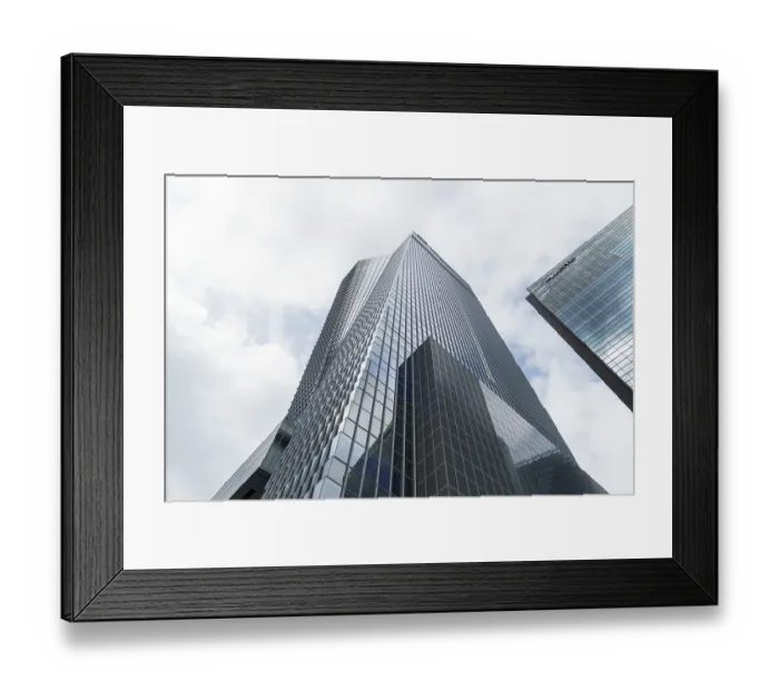 Framed Print : Tokyo, Japan - August 08, 2024: Low angle view of office buildings in Toranomon Hills area against sky