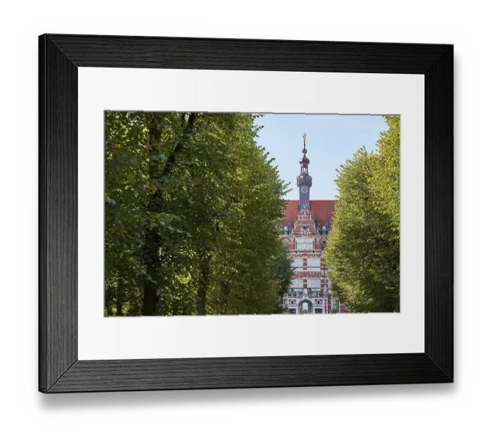 Framed Print : The main building of Gdansk University of Technology or Politechnika Gdanska among trees on the approaching alley