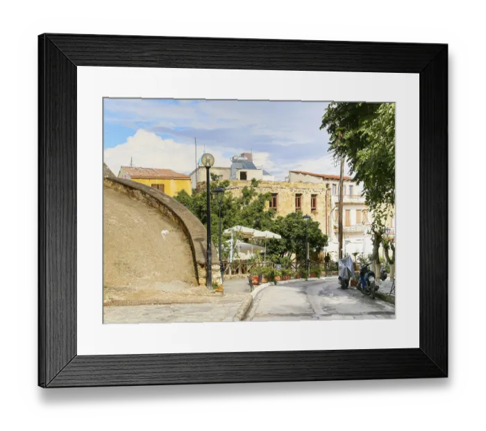 Framed Print : Ramp leading up the Schiavo Bastion in Chania in Crete and road leading downhill into town Framed Print : Ramp leading up the Schiavo Bastion in Chania in Crete and road leading downhill into town