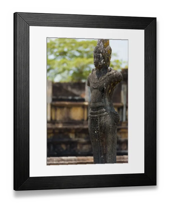 Framed Print : A weathered Buddha statue stands exposed to the elements at the ancient kingdom ruins of Polonnaruwa in Sri Lanka Framed Print : A weathered Buddha statue stands exposed to the elements at the ancient kingdom ruins of Polonnaruwa in Sri Lanka