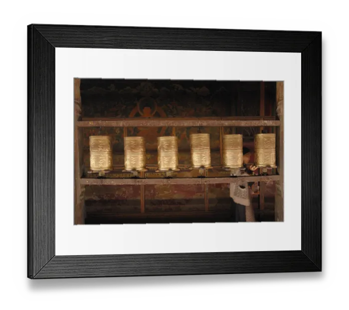 Framed Print : Prayer wheels and a Tibetan pilgrim in Jokhang Temple