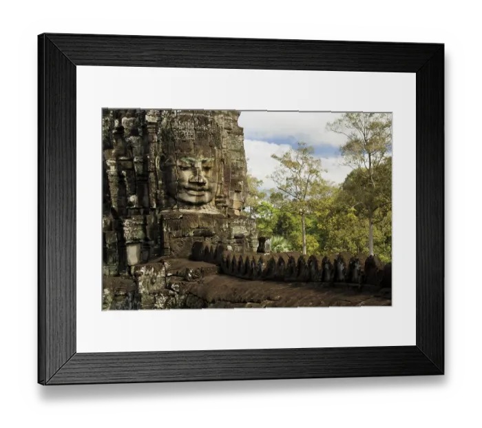 Framed Print : Buddha face carving inside Bayon Temple in Angkor Thom complex