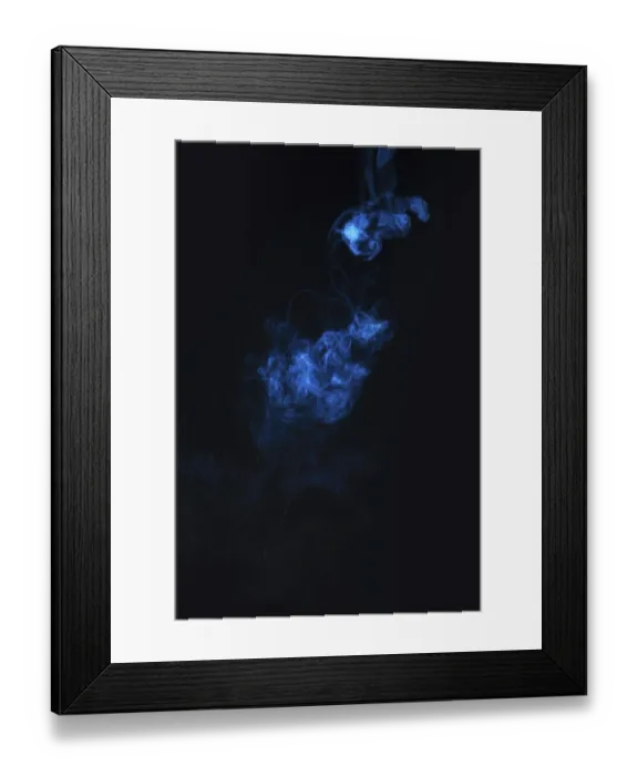 Framed Print : Blue smoke against black background Framed Print : Blue smoke against black background