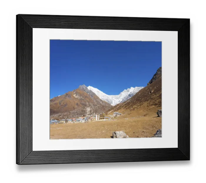 Framed Print : Majestic view of snow-capped Langtang Lirung Himalayan mountain range with Kyanjin Gompa village in foreground in Nepal