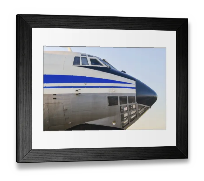 Framed Print : Cockpit of a large vintage civilian plane with blue stripes isolated closeup Framed Print : Cockpit of a large vintage civilian plane with blue stripes isolated closeup