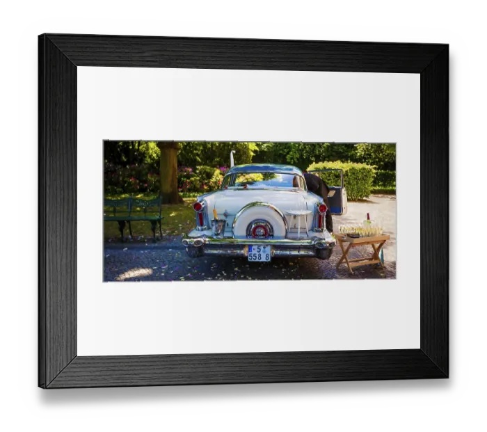 Framed Print : White Cadillac with champaign glasses
