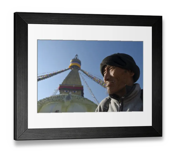 Framed Print : Pilgrim in front of Boudnath Stupa Framed Print : Pilgrim in front of Boudnath Stupa