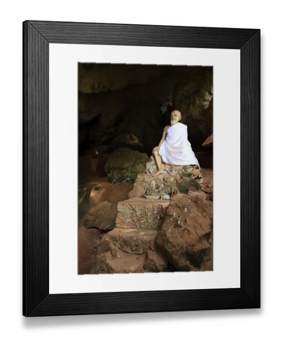 Framed Print : Sitting statue of a monk, cave temple Wat Tham Suwan Khuha