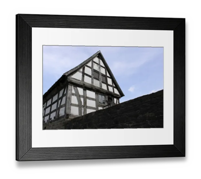 Framed Print : Half-timbered house with wall