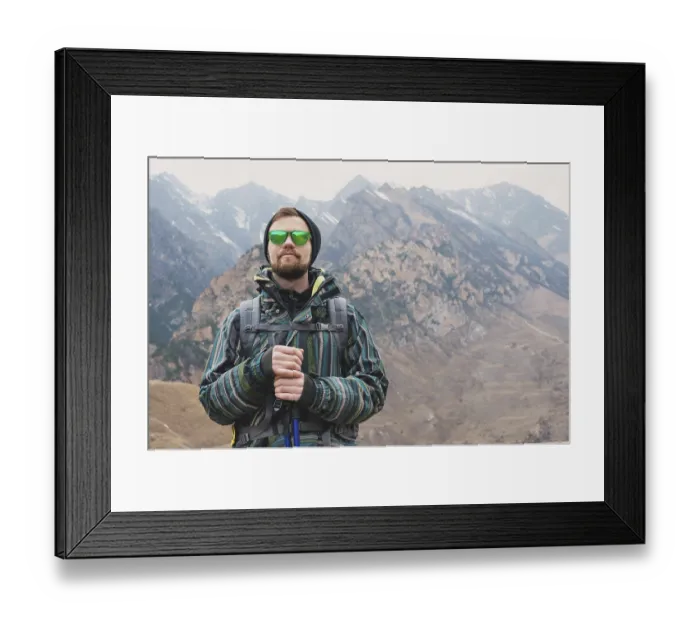 Framed Print : A guy with a beard and wearing sunglasses in a membrane jacket Framed Print : A guy with a beard and wearing sunglasses in a membrane jacket