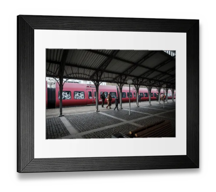 Framed Print : Dyrehaven Train station platform with passengers boarding a red train Framed Print : Dyrehaven Train station platform with passengers boarding a red train