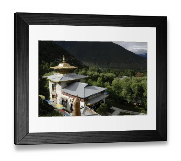 Framed Print : Lamaling, Tibetan Buddhist monastery in front of wooded mountains of the Himalayas Framed Print : Lamaling, Tibetan Buddhist monastery in front of wooded mountains of the Himalayas