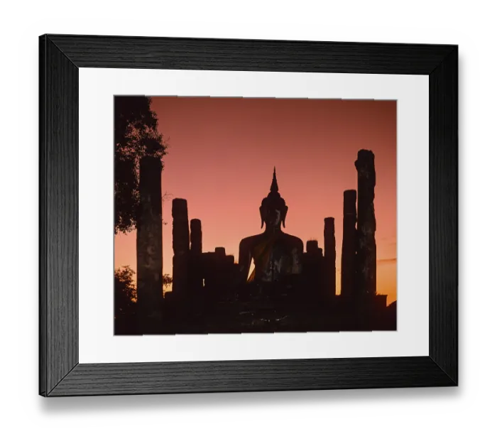 Framed Print : Seated Buddha at Wat Mahathat, silhouette at dusk Framed Print : Seated Buddha at Wat Mahathat, silhouette at dusk