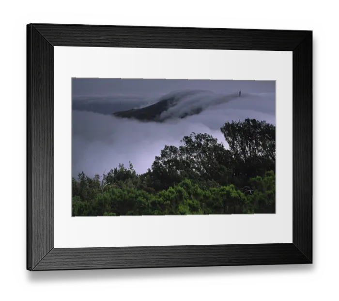 Framed Print : Clouds over the tops of the National Park Garajonay