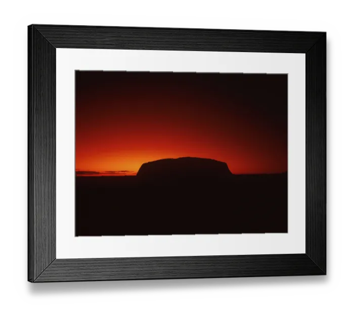 Framed Print : Silhouette outline of Ayers Rock or Uluru in red sunrise or sunset
