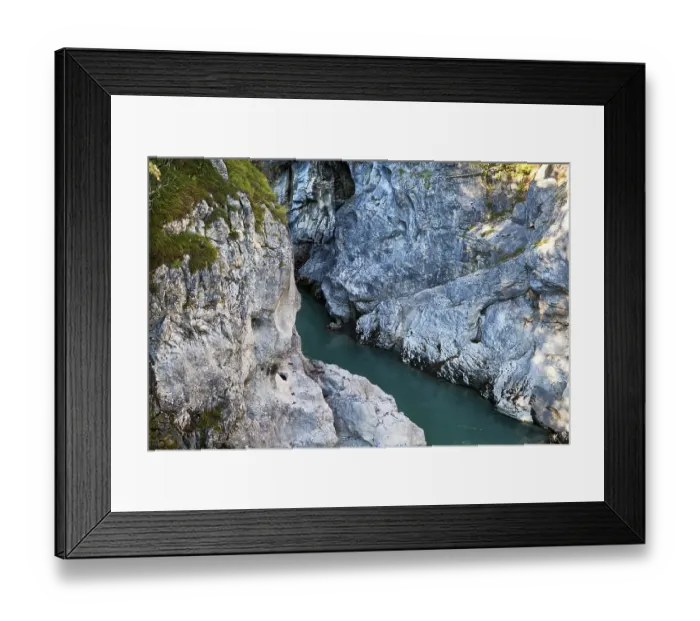 Framed Print : Blue alpine river between two cliffs