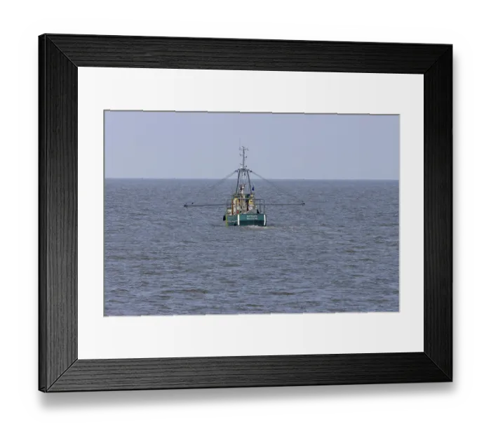 Framed Print : Fishing boat trawls the North Sea for shrimp
