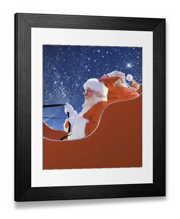 Framed Print : Santa Claus in a sleigh filled with presents soaring through a starry night sky