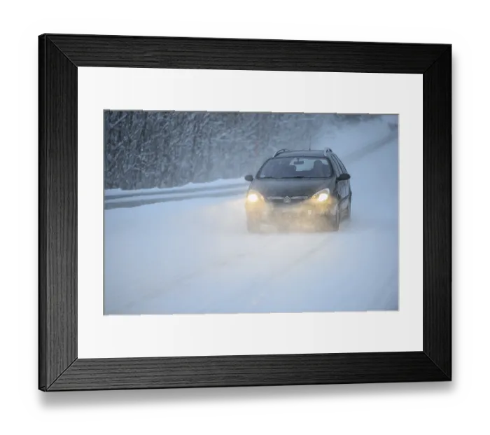 Framed Print : Truck driving on snowy road, winter driving
