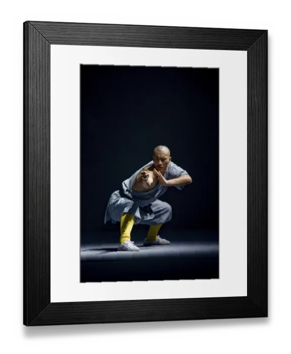 Framed Print : Shaolin monk concentrating to gather energy Framed Print : Shaolin monk concentrating to gather energy