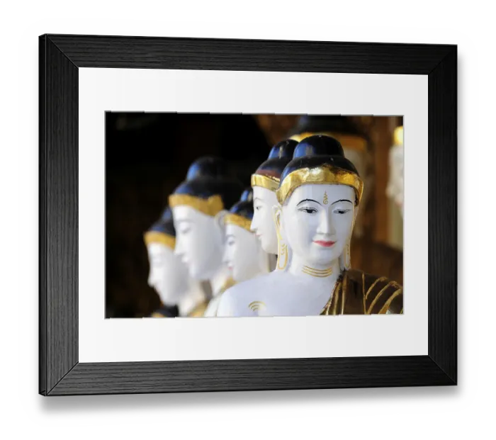 Framed Print : Heads of Buddha statues in a temple Framed Print : Heads of Buddha statues in a temple