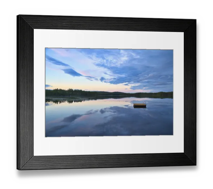 Framed Print : Swimming island in Sweden on a lake at sunset