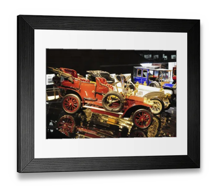 Framed Print : Shiny vintage Mercedes-Benz car on display with striking red rims and reflections Framed Print : Shiny vintage Mercedes-Benz car on display with striking red rims and reflections