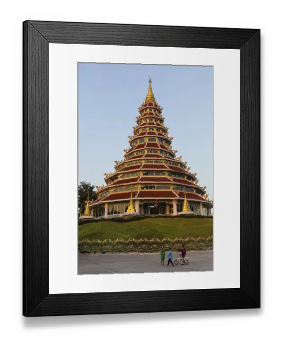 Framed Print : Children playing in front of the nine-story pagoda of the Wat Huay Pla Kang temple Framed Print : Children playing in front of the nine-story pagoda of the Wat Huay Pla Kang temple