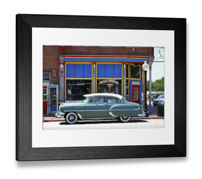 Framed Print : Vintage car in front of the Superman Museum in the historic district of Metropolis