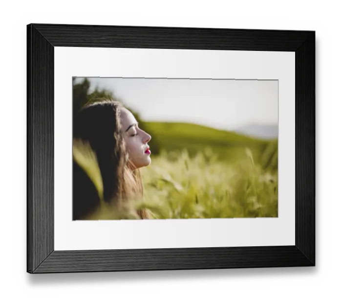Framed Print : Woman sitting meditating grass