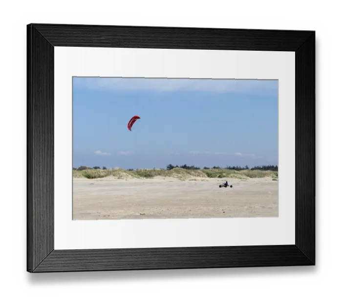 Framed Print : Ringby, Denmark - 30 May, 2021: kite buggy enjoying a windy day on the Wadden Sea island beaches of western Denmark Framed Print : Ringby, Denmark - 30 May, 2021: kite buggy enjoying a windy day on the Wadden Sea island beaches of western Denmark