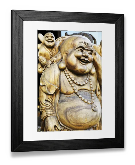 Framed Print : Wooden Buddha figurines near Ubud, Bali, Indonesia