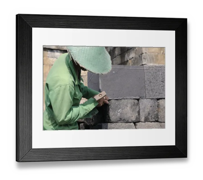 Framed Print : Man doing stonemasonry, restoration of the Borobudur temple