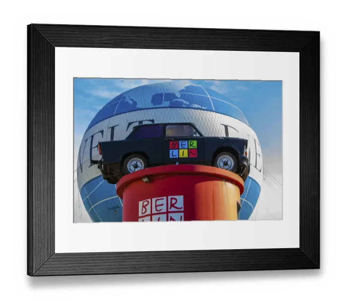Framed Print : Old Trabant on a red pillar Framed Print : Old Trabant on a red pillar