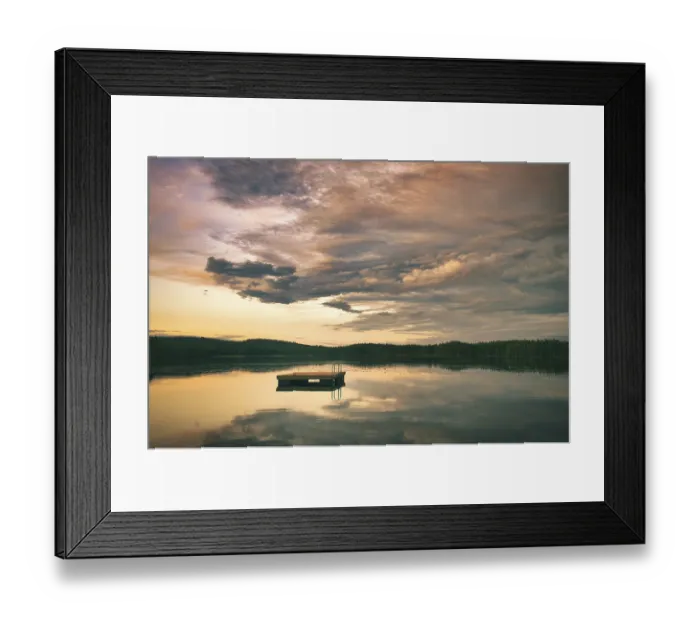 Framed Print : Swimming island in Sweden on a lake at sunset