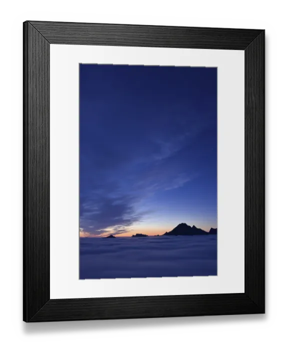 Framed Print : Clouds and mountain peaks, view from Offersoykammen at dusk