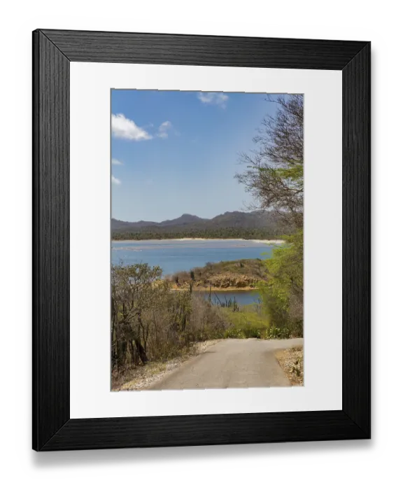 Framed Print : Landscape with road, lake and mountains on island Bonaire