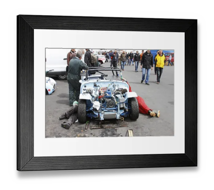 Framed Print : Repairing a Triumph TR3 race car Framed Print : Repairing a Triumph TR3 race car